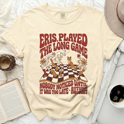 Cream t-shirt with "Eris Played The Long Game" text and fox chess illustration.