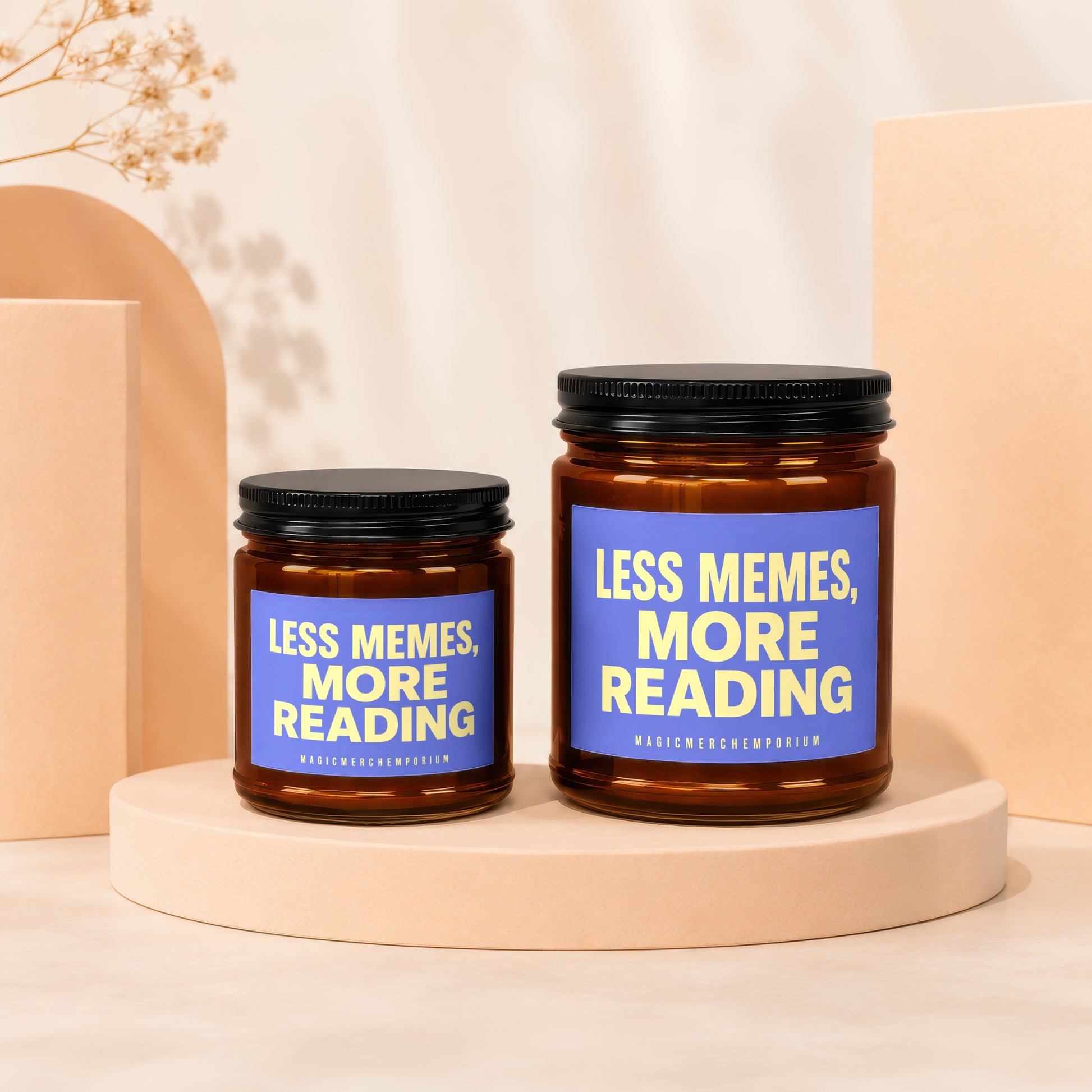 Two amber jars with black lids and blue labels reading "LESS MEMES, MORE READING".