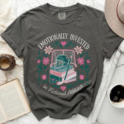 Gray t-shirt with "Emotionally Invested in Fictional Athletes" and hockey motif.