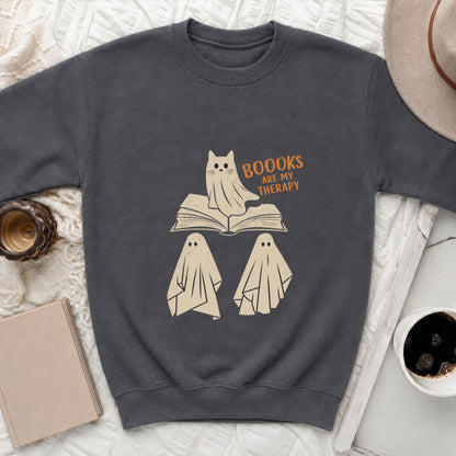 Dark gray sweatshirt with ghost cat on an open book. Text says "Booooks Are My Therapy".