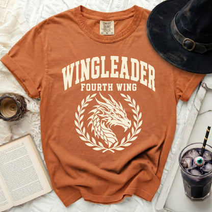 Orange t-shirt with "WINGLEADER FOURTH WING" and dragon graphic.