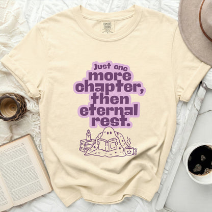 Cream t-shirt with "Just one more chapter, then eternal rest" text and a reading ghost.