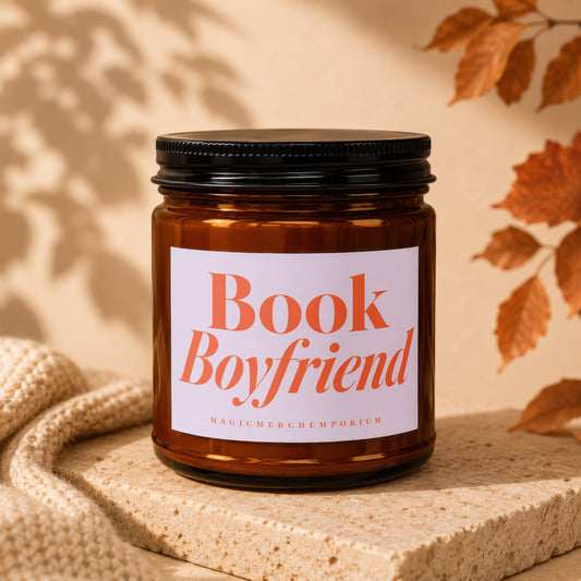 Amber glass jar candle with "Book Boyfriend" text on label.