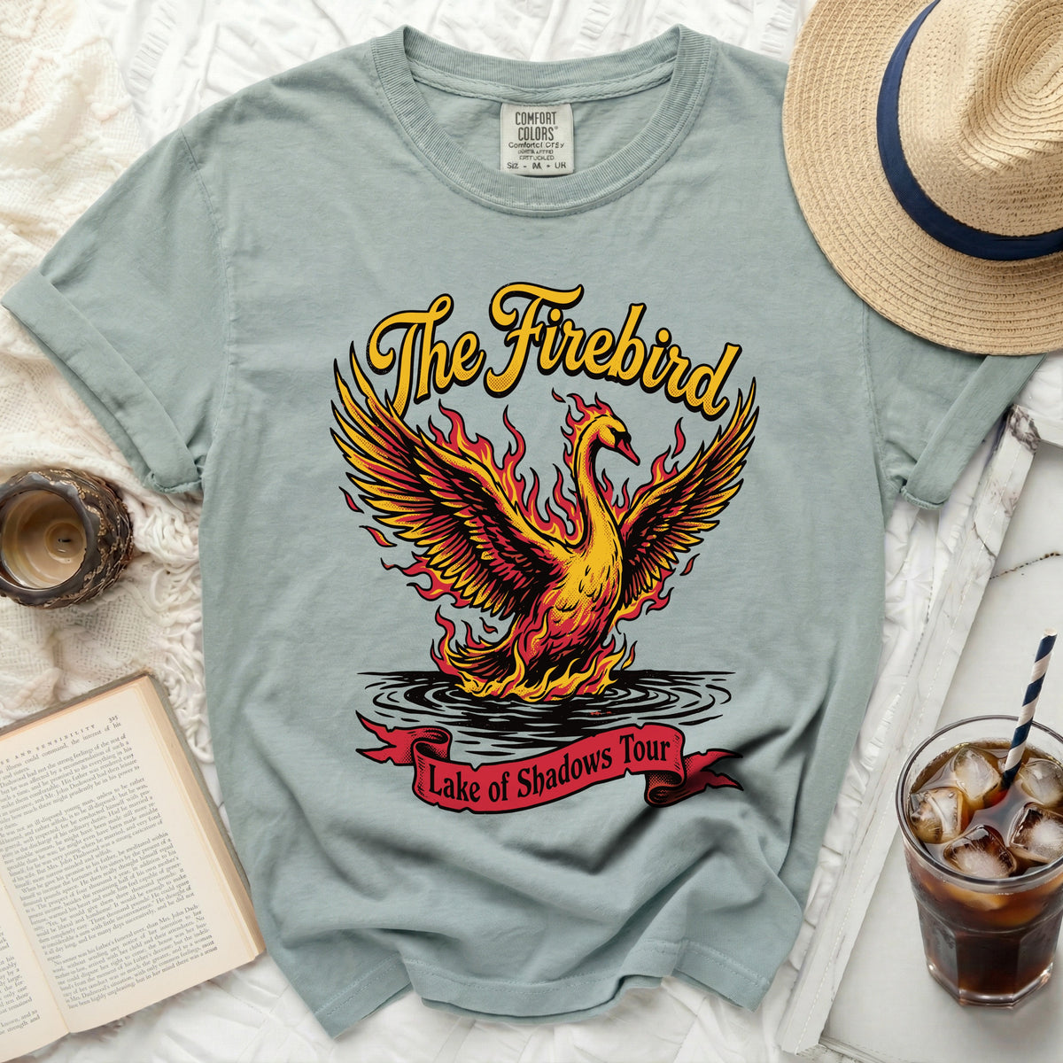 The Firebird graphic tee with a phoenix and "Lake of Shadows Tour" text.