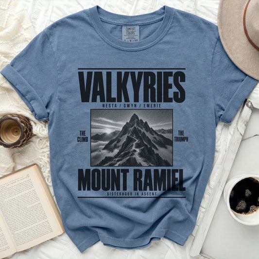 Blue t-shirt with "Valkyries Mount Ramiel" text and mountain graphic.