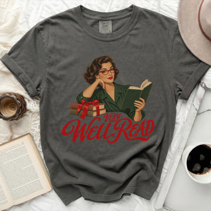 Dark grey t-shirt with a vintage illustration of a woman reading and the text "VERY Well Read".