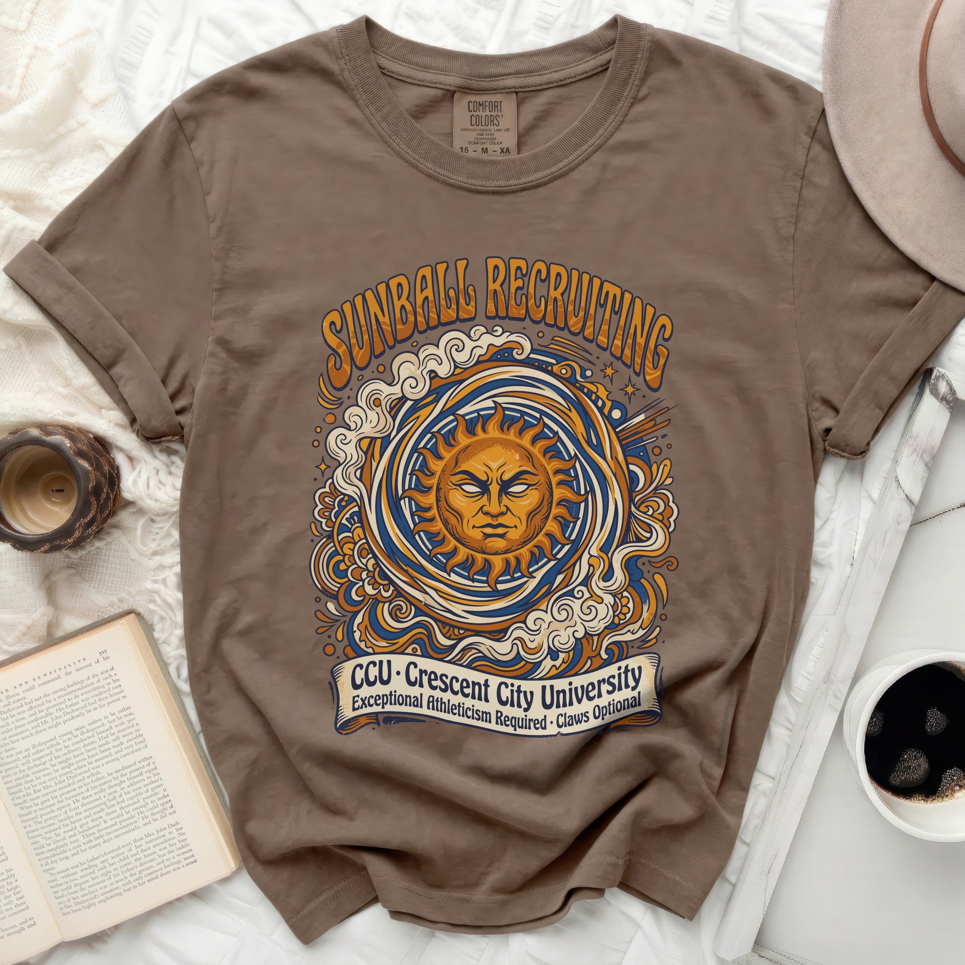 Brown Comfort Colors t-shirt with "Sunball Recruiting CCU" graphic.