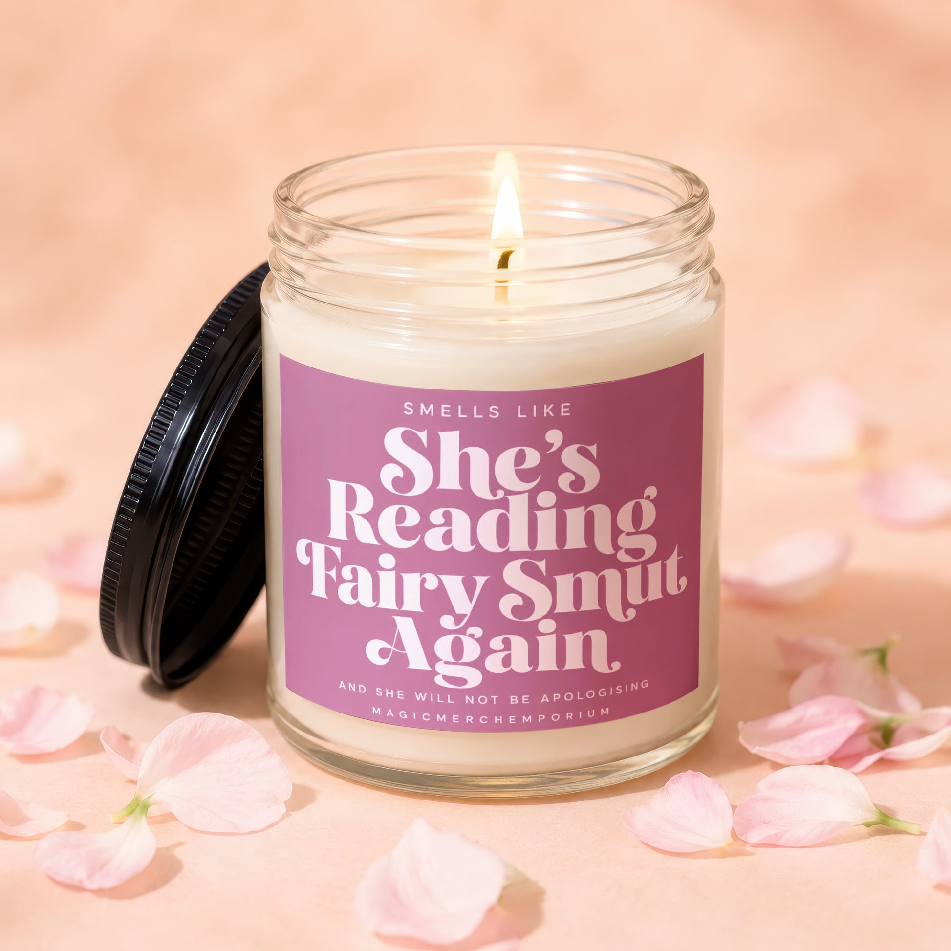 Candle with label "Smells Like She's Reading Fairy Smut Again".
