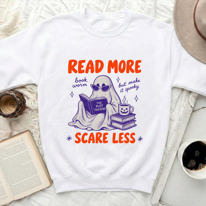 Ghost reading a book with text "Read More Book Worm", "The Plot Thickens", "But Make It Spooky", "Scare Less".