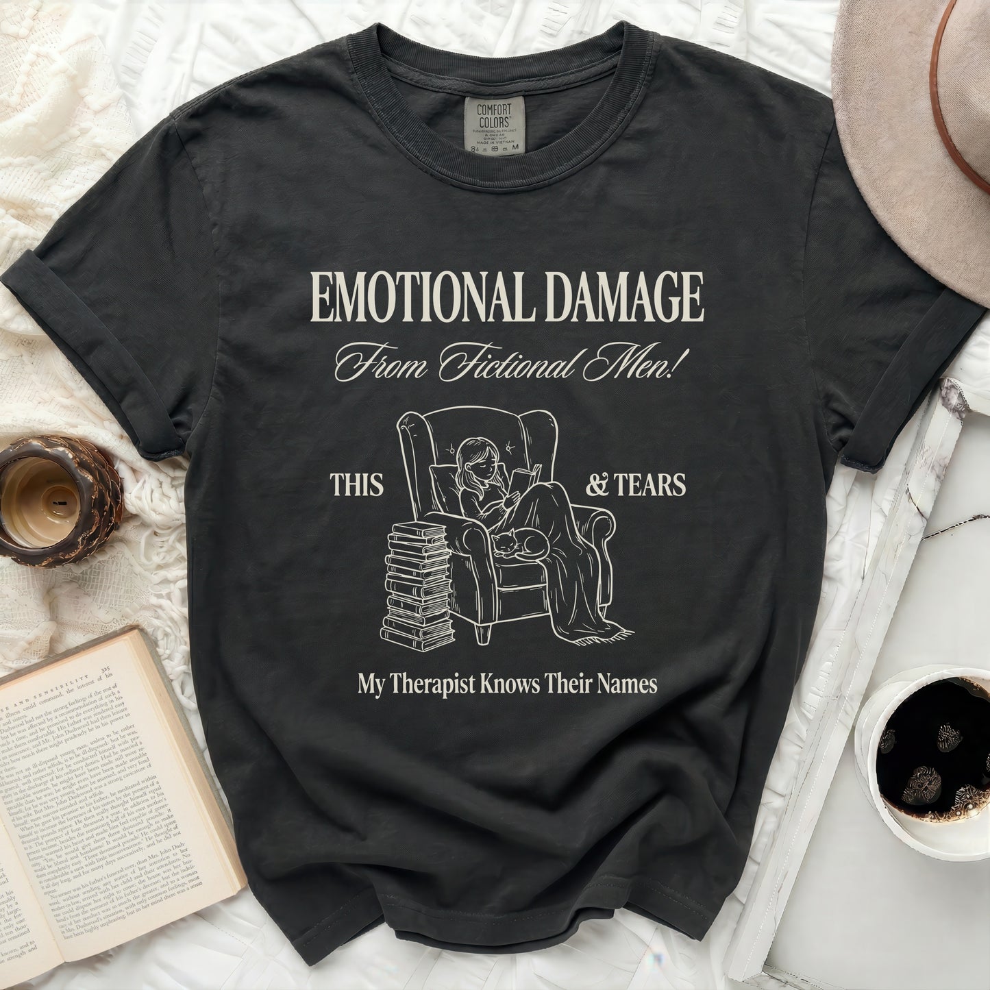 T-shirt with "Emotional Damage From Fictional Men! This & Tears" text.