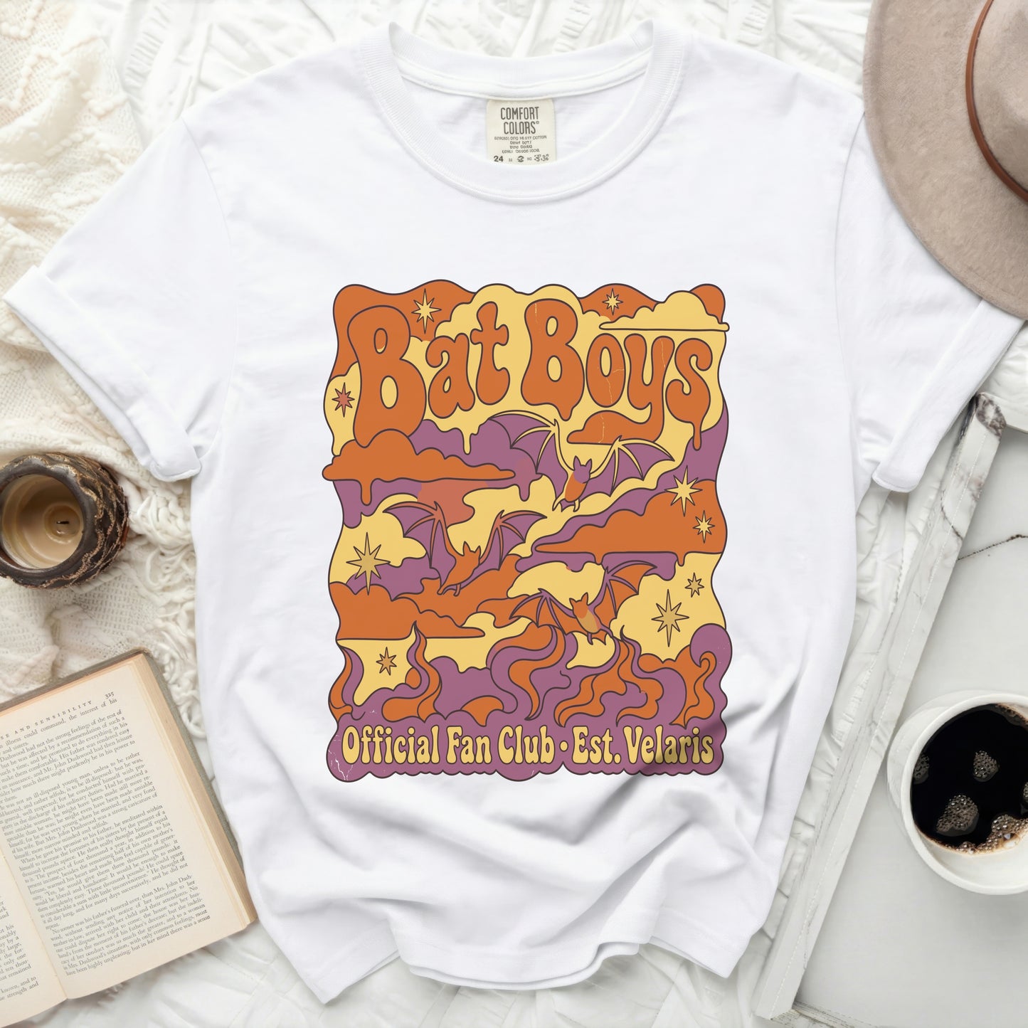 White t-shirt with "Bat Boys Official Fan Club Est. Velaris" graphic.