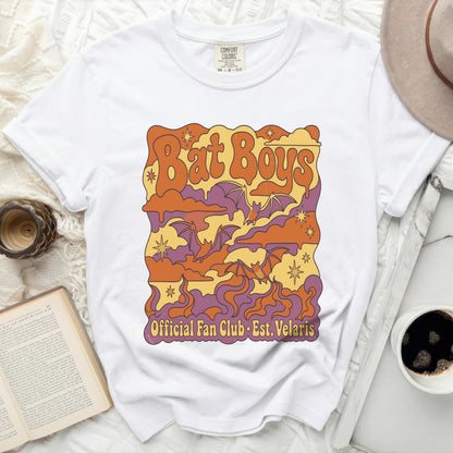 White t-shirt with "Bat Boys Official Fan Club Est. Velaris" graphic.