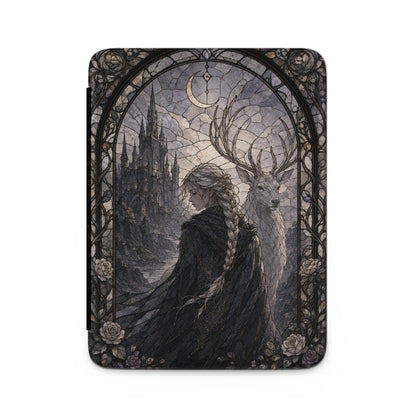 Stained glass design of a woman, stag, and castle under a crescent moon.
