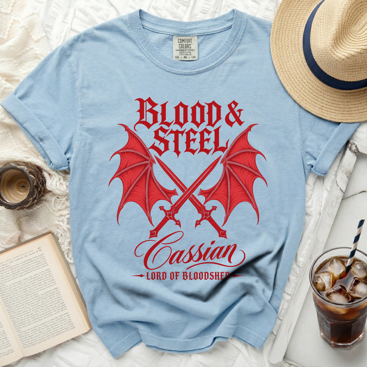 Light blue t-shirt with "Blood & Steel Cassian Lord of Bloodshed" graphic.