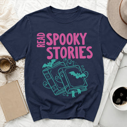 Navy t-shirt with pink "Read Spooky Stories" text and turquoise Halloween illustrations.