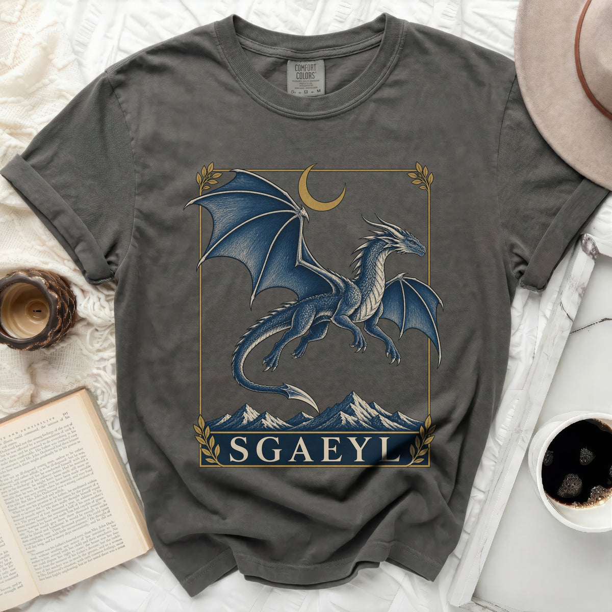 Dark grey t-shirt with a blue dragon design and the word SGAEYL.