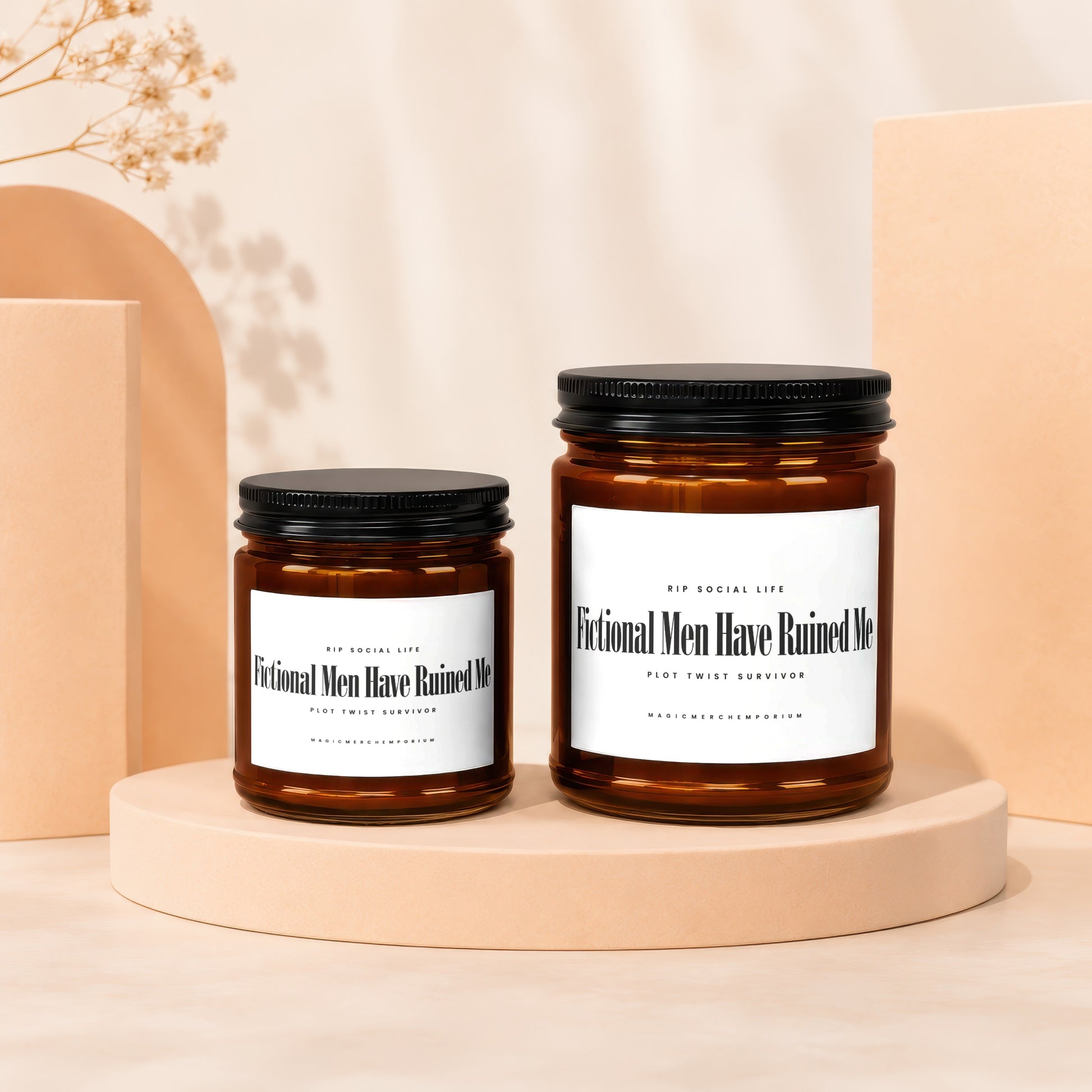 Two amber glass candles labeled "Fictional Men Have Ruined Me".
