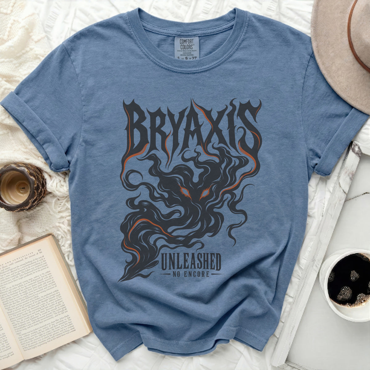 Blue t-shirt with "BRYAXIS UNLEASHED NO ENCORE" graphic and smoky design.