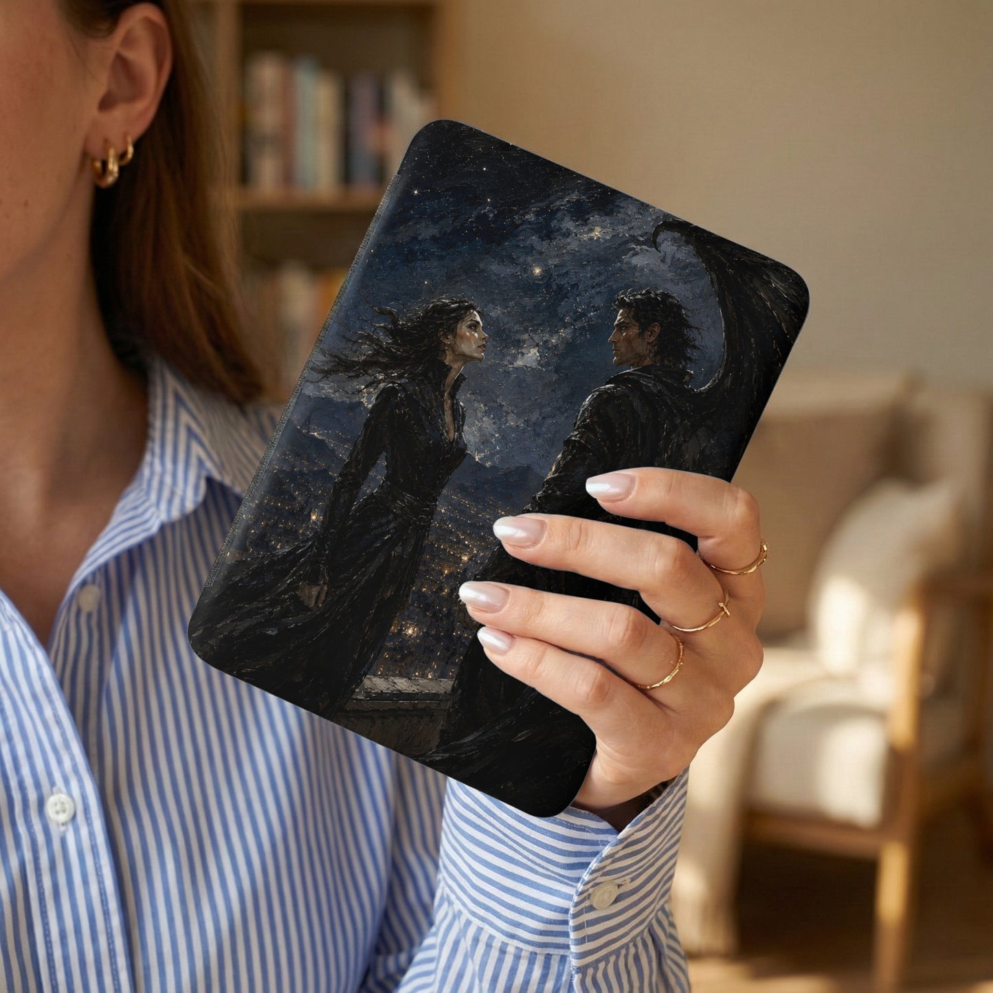 Tablet case with dark starry sky, winged figure, and woman over city lights