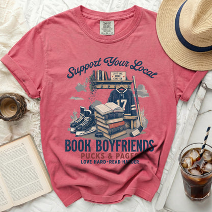 T-shirt with hockey and book graphics and "Book Boyfriends" text.