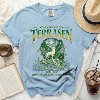 Light blue t-shirt with deer, mountains, and text "THE KINGDOM OF TERRASEN HOME OF THE LORD OF THE NORTH".