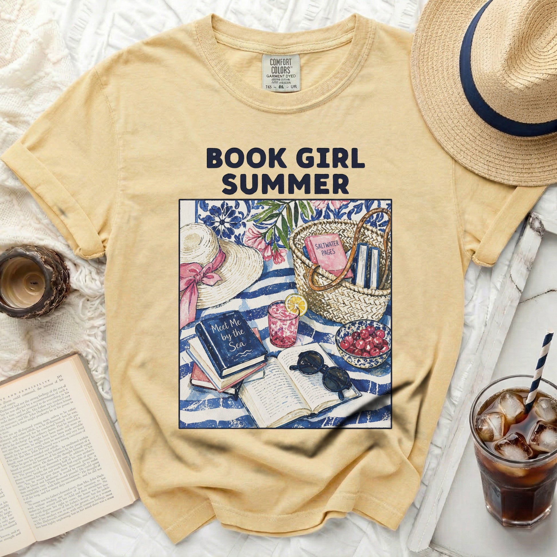 Yellow t-shirt with "Book Girl Summer" graphic and beach scene.