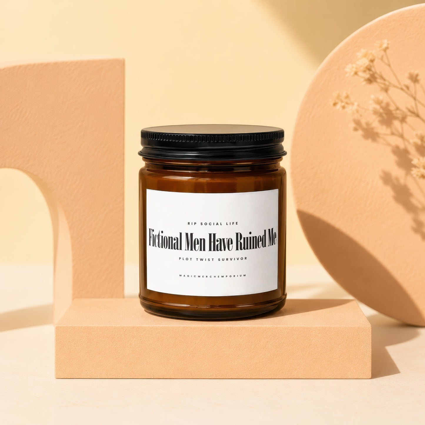 Amber jar candle with black lid titled "Fictional Men Have Ruined Me."