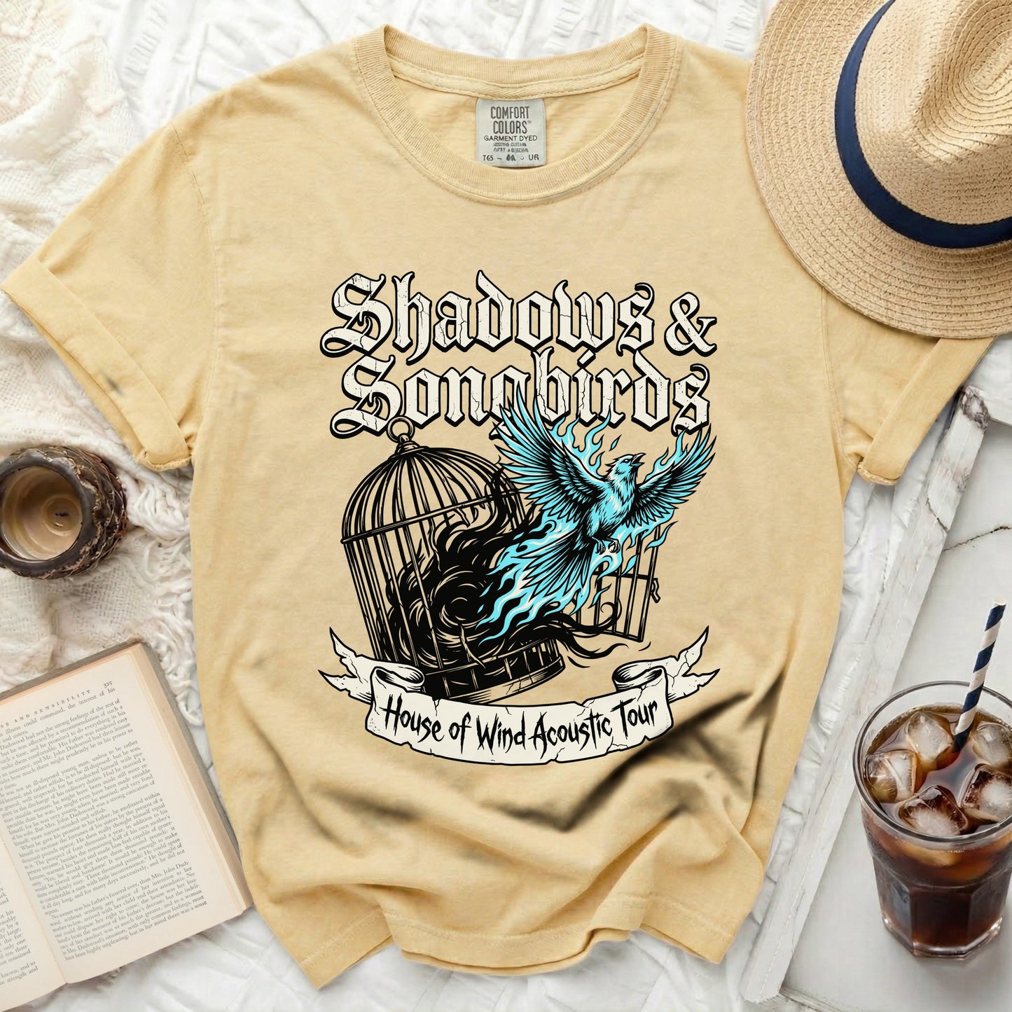 Yellow t-shirt with "Shadows & Songbirds" and "House of Wind Acoustic Tour" graphic.