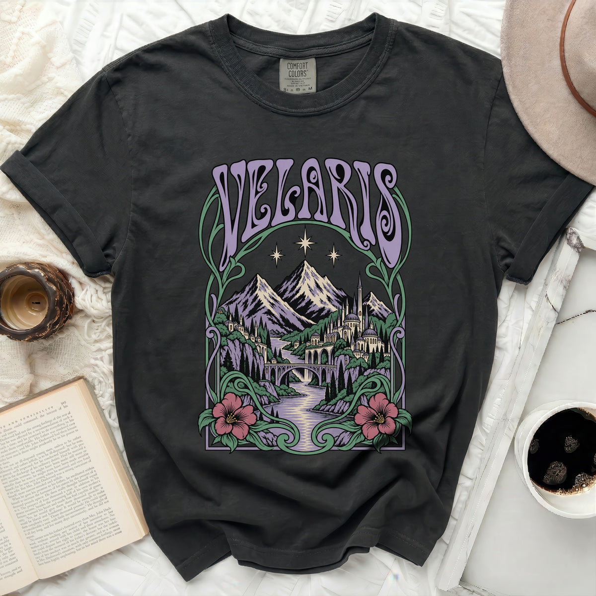 Charcoal t-shirt with purple "Velaris" text over a fantasy castle and mountains scene.