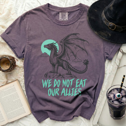 Purple t-shirt with a black dragon graphic and text "We Do Not Eat Our Allies".