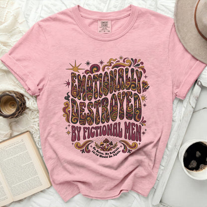 Pink t-shirt with "Emotionally Destroyed by Fictional Men" text and mushroom graphic.