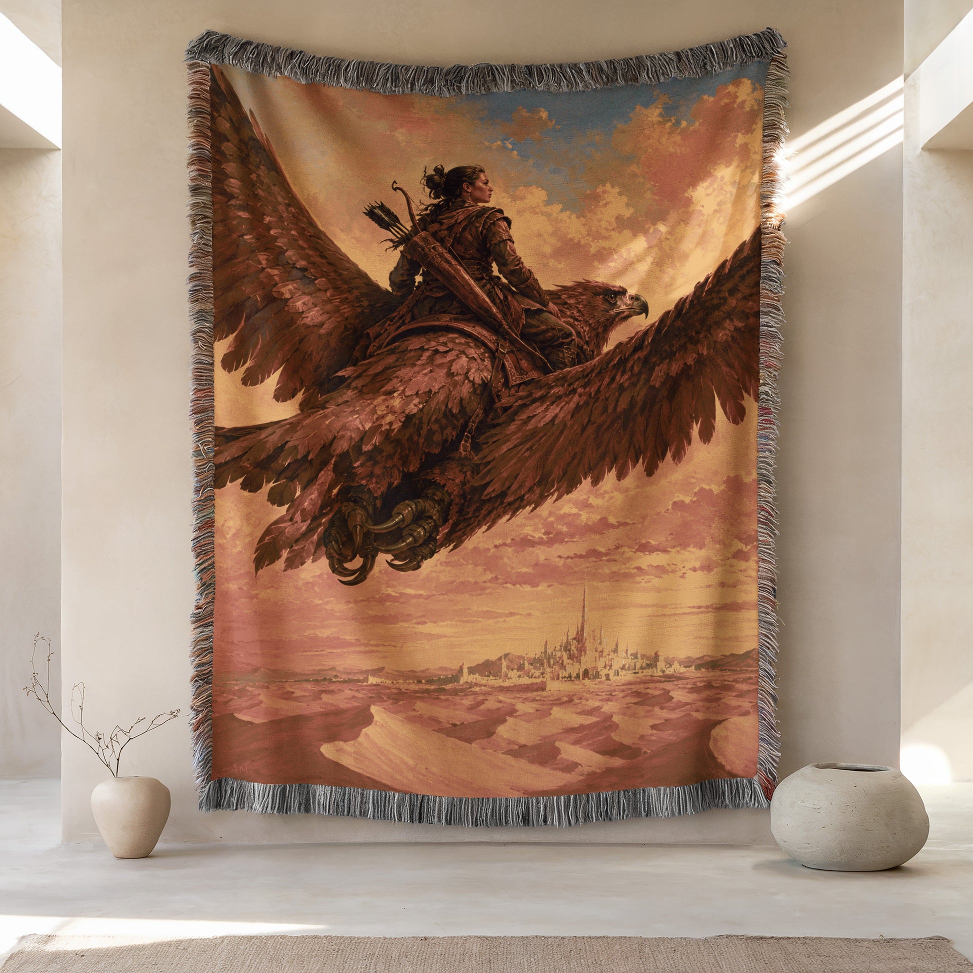 a large tapestry hanging on a wall, depicting a person riding a winged creature, possibly a dragon or a mythical bird. The tapestry is surrounded by a decorative border, and there are two small vases placed on either side of the tapestry.