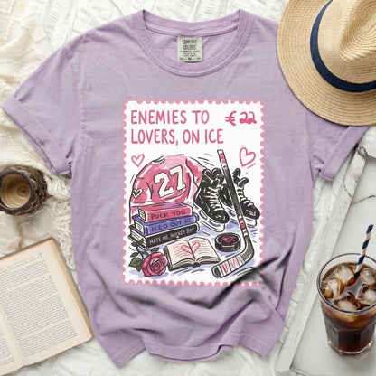 Purple t-shirt with "Enemies to Lovers, On Ice" hockey graphic.