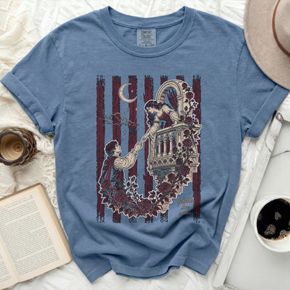 Blue t-shirt with a romantic balcony scene and "forbidden love reader" text.