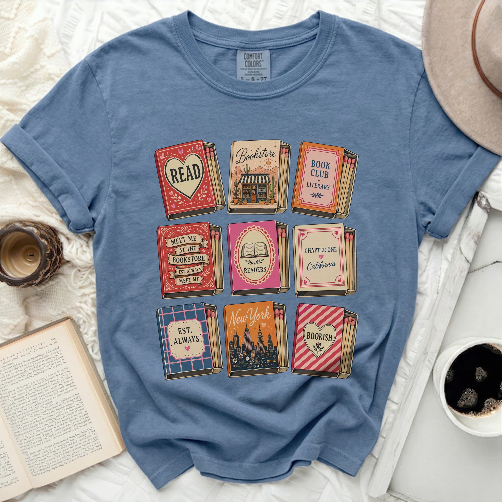 T-shirt with book-themed matchboxes and literary quotes.