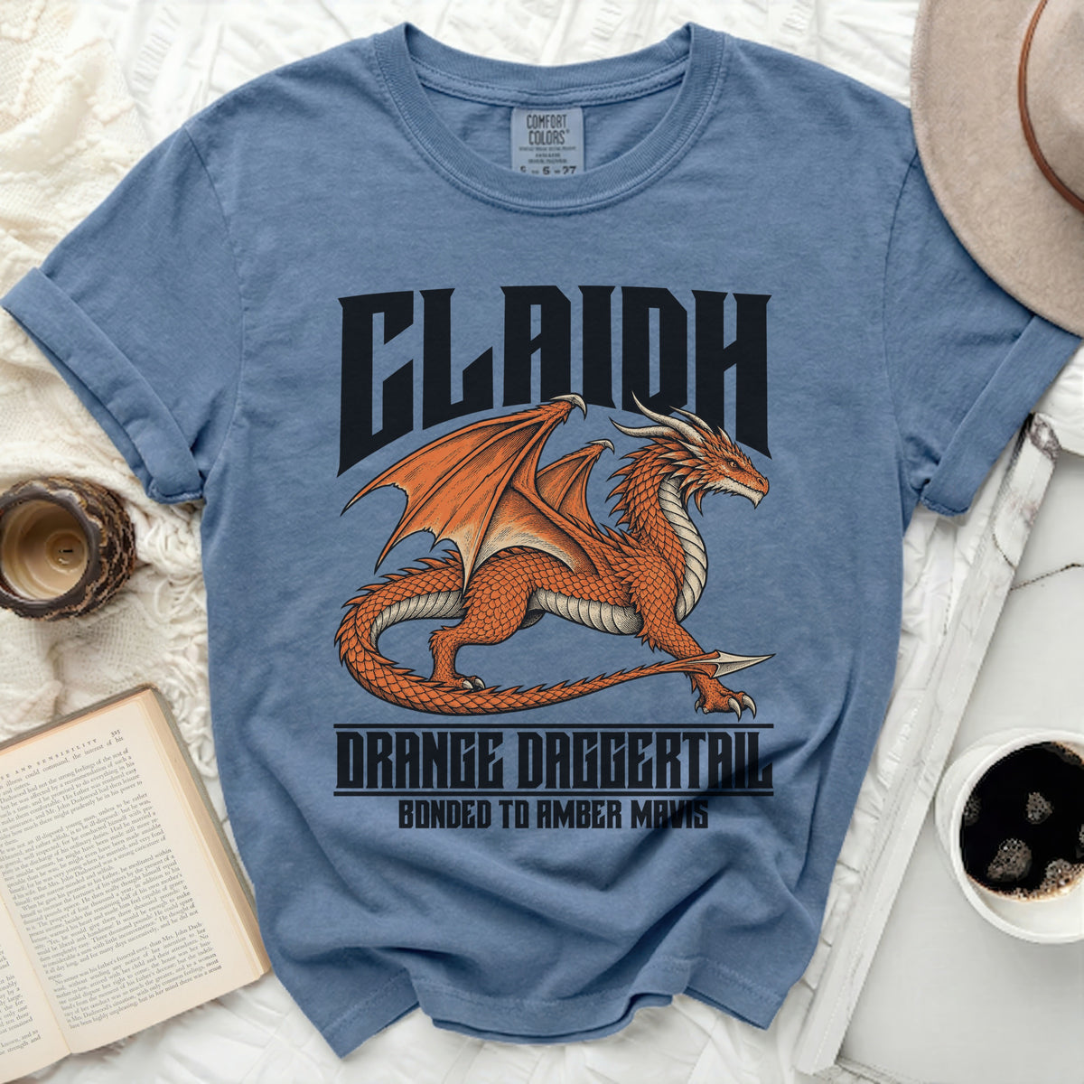 Blue Comfort Colors t-shirt with an orange dragon graphic and text.