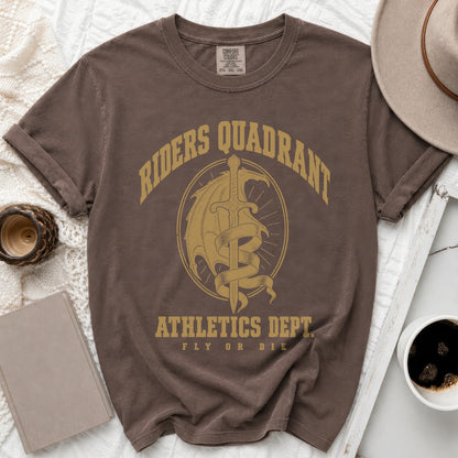 Brown crewneck t-shirt featuring yellow graphic text reading Riders Quadrant Athletics Dept Fly or Die around a dragon and sword emblem.
