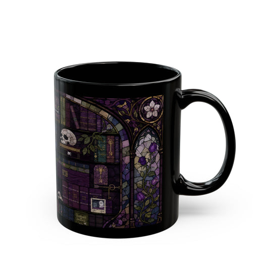 Black mug with a stained-glass design of books, skulls, keys, and roses.