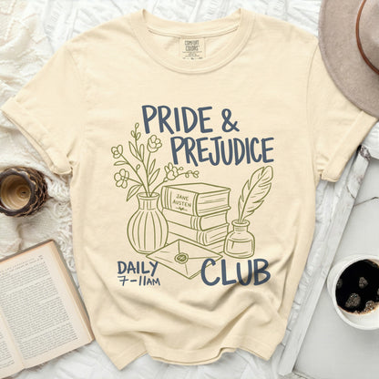 Pride and Prejudice Club t-shirt with books, quill, and flowers artwork.