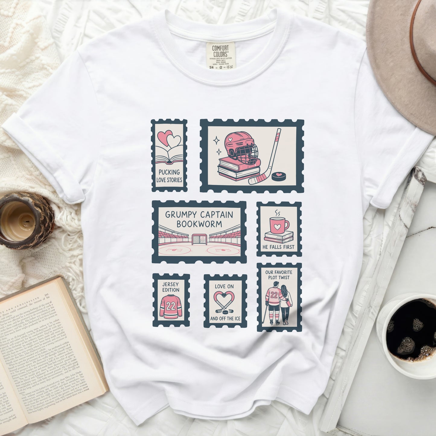 White t-shirt with "Pucking Love Bookworm" stamp graphic and hockey themes.