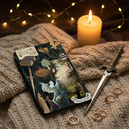 Fantasy journal with dragons, a white dragon, knights, and text that reads "Book Lover".