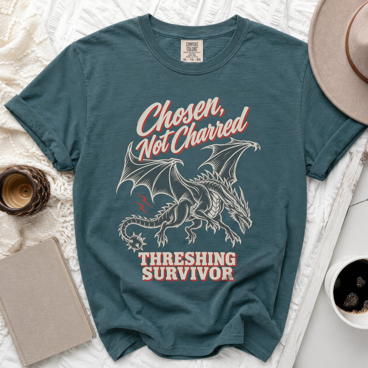 Teal t-shirt with dragon graphic and text "Chosen, Not Charred Threshing Survivor".