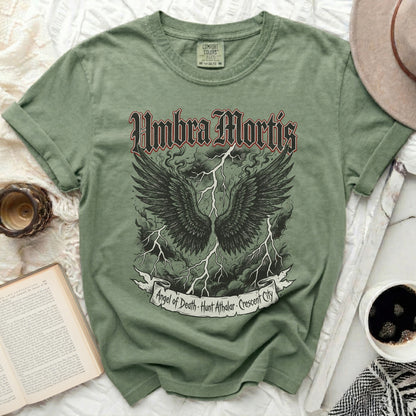 Green t-shirt with "Umbra Mortis" and "Angel of Death Hunt Athalar Crescent City" text.