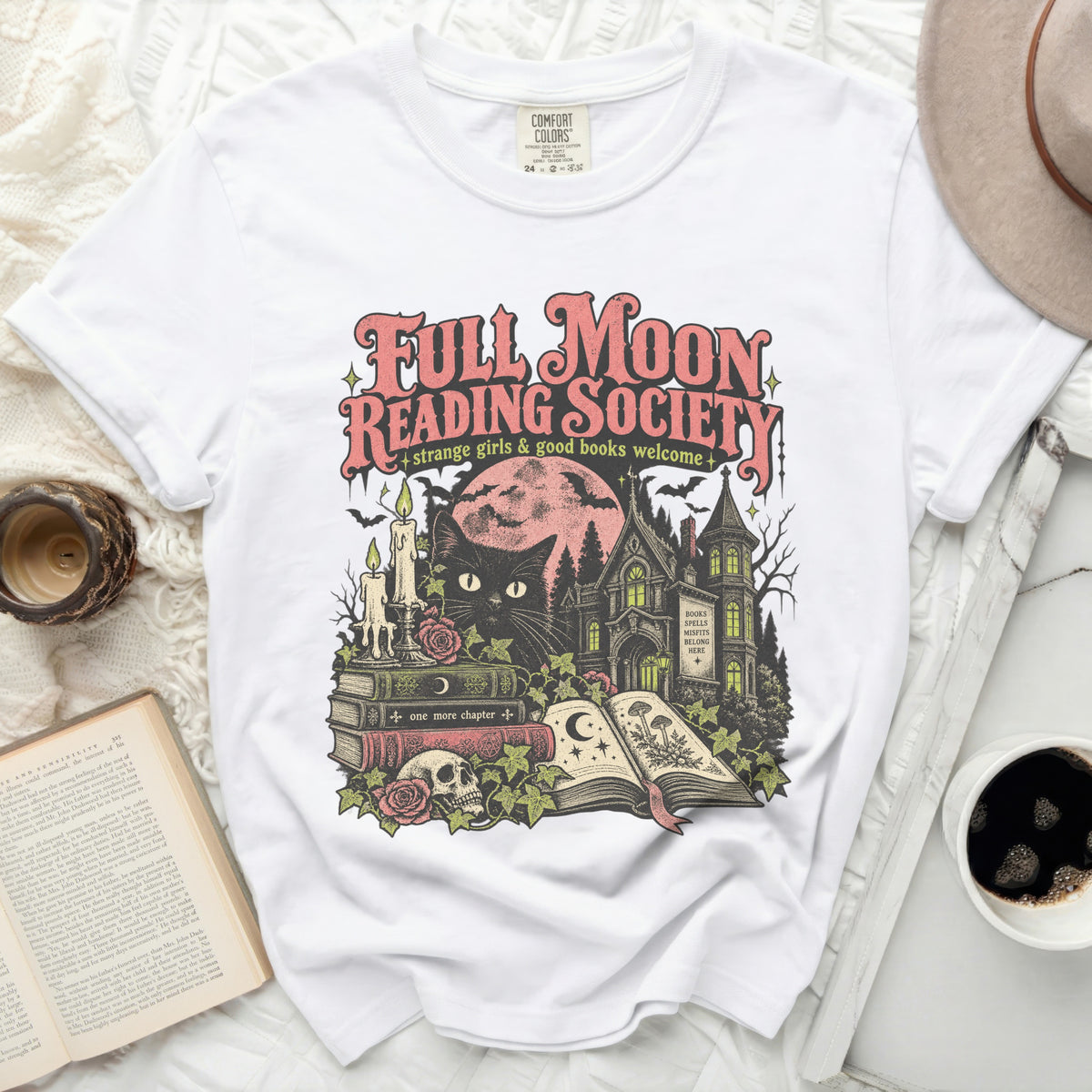 White t-shirt with "Full Moon Reading Society" and spooky graphics.