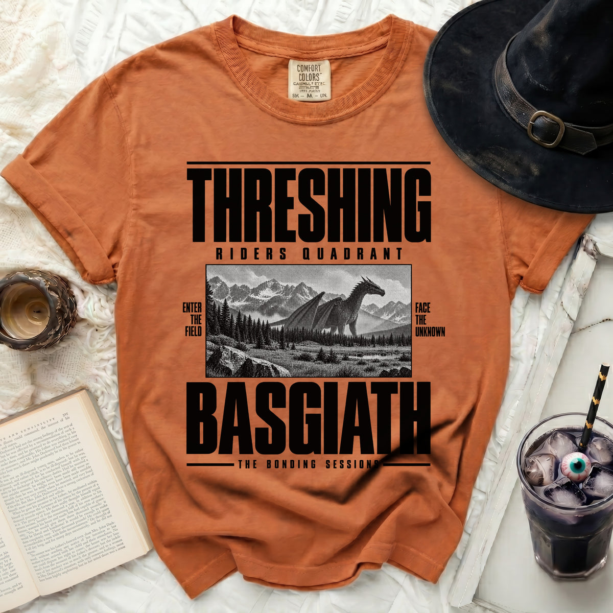 Orange t-shirt with "THRESHING RIDERS QUADRANT BASGIATH THE BONDING SESSIONS" text and dragon graphic.
