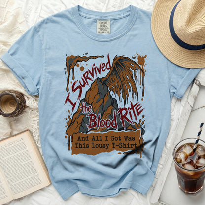 Light blue t-shirt with "I Survived the Blood Rite And All I Got Was This Lousy T-Shirt" graphic.