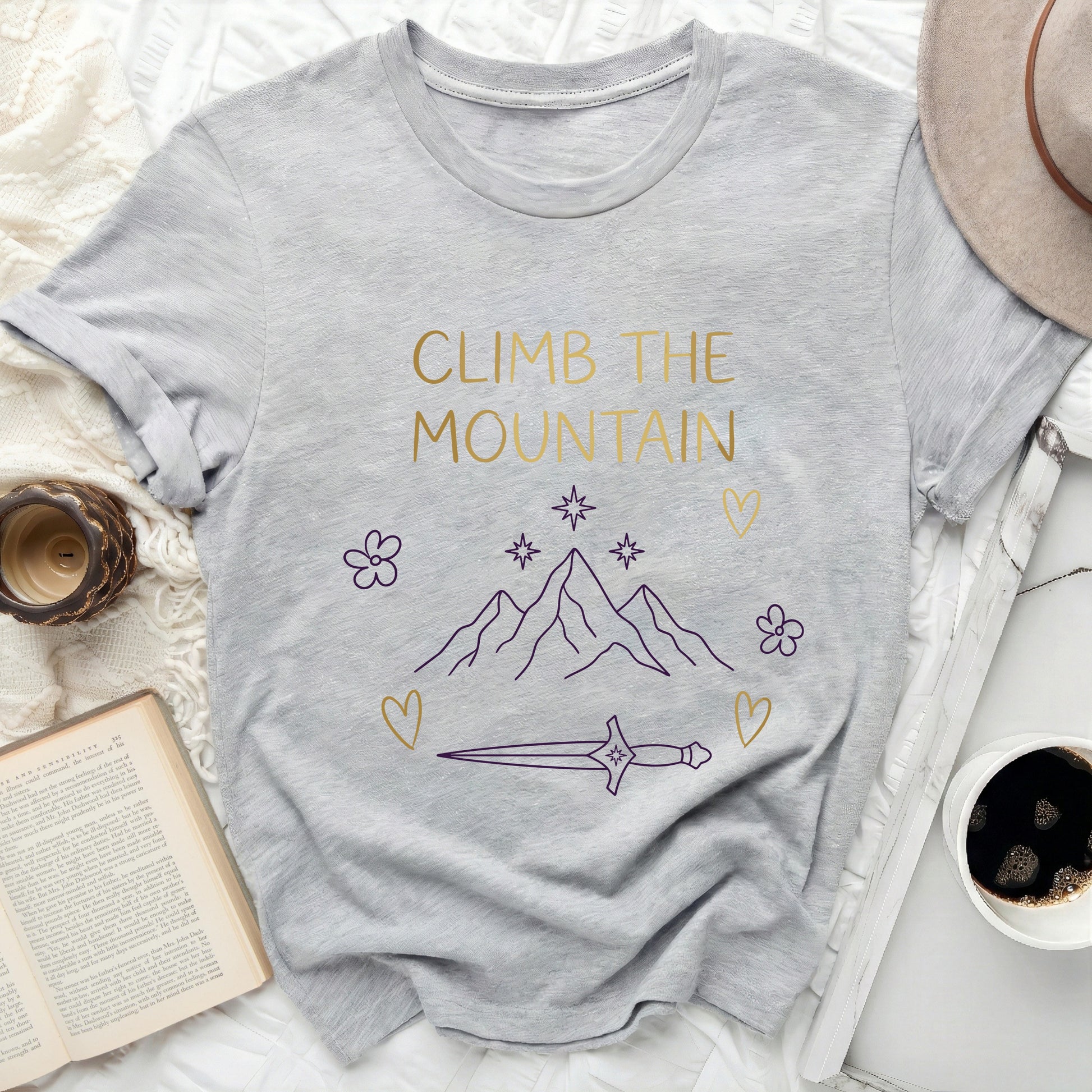 Climb The Mountain Dagger Stars Flowers Hearts Design product type
Tshirt, Apparel, Clothing, Graphic Tee, Mountain Design, Climb The Mountain, Adventure, Nature Lover, Outdoor Life, Explore, Stars Art, Flower Graphic, Heart Symbol, Dagger Motif, Inspirational, Motivational, Fantasy Style, Unique Print, Grey Shirt, Gold Accents