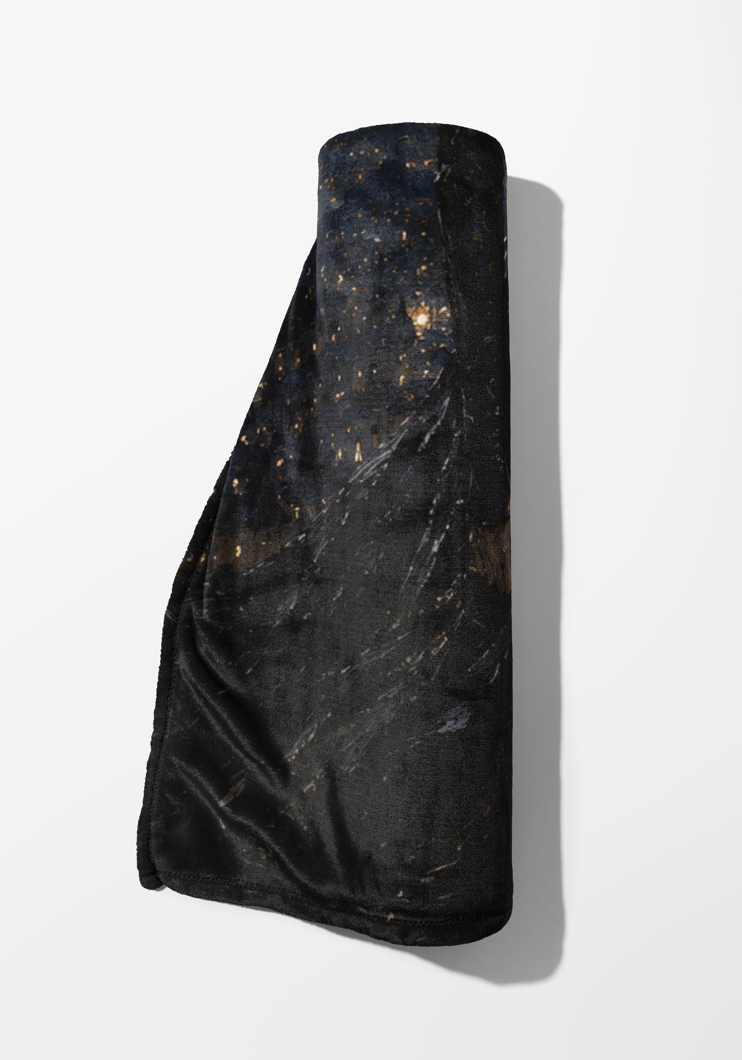 Rolled black throw blanket with a dark, speckled pattern resembling a starry night.