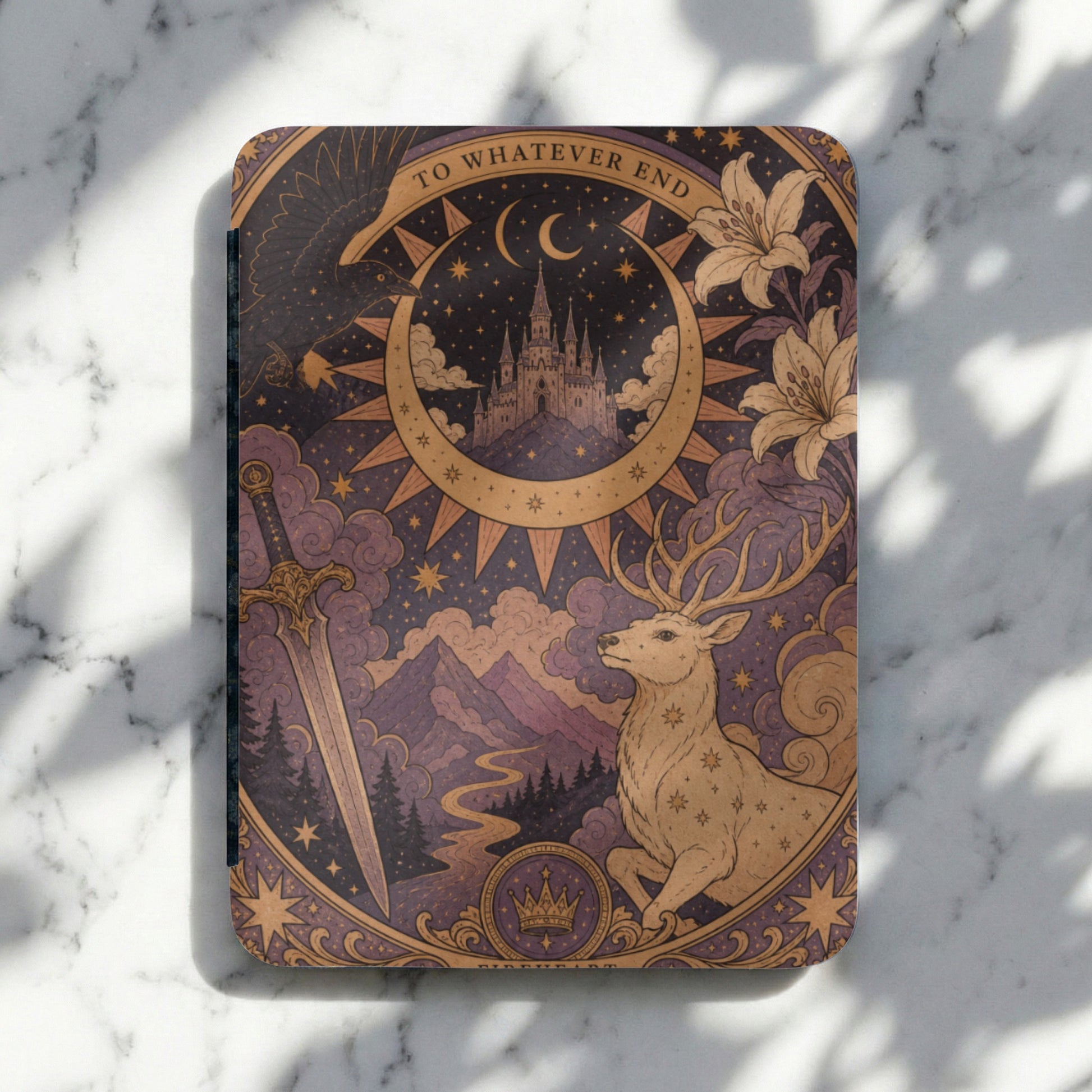Journal with celestial art including a stag, sword, castle, and the phrase "To Whatever End."