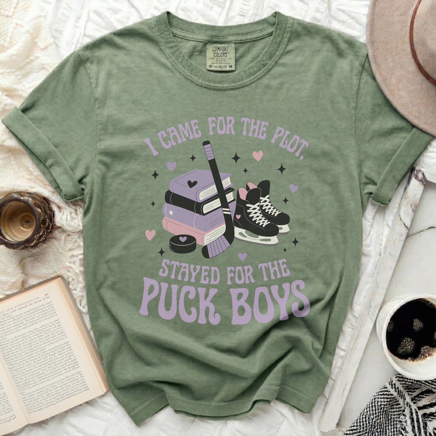 Green t-shirt with text "I came for the plot, stayed for the puck boys".